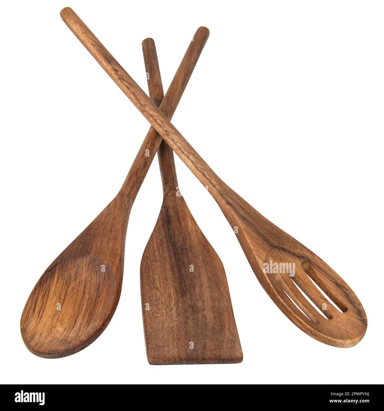 Wooden spoons, spatulas and a rolling pin isolated on white background