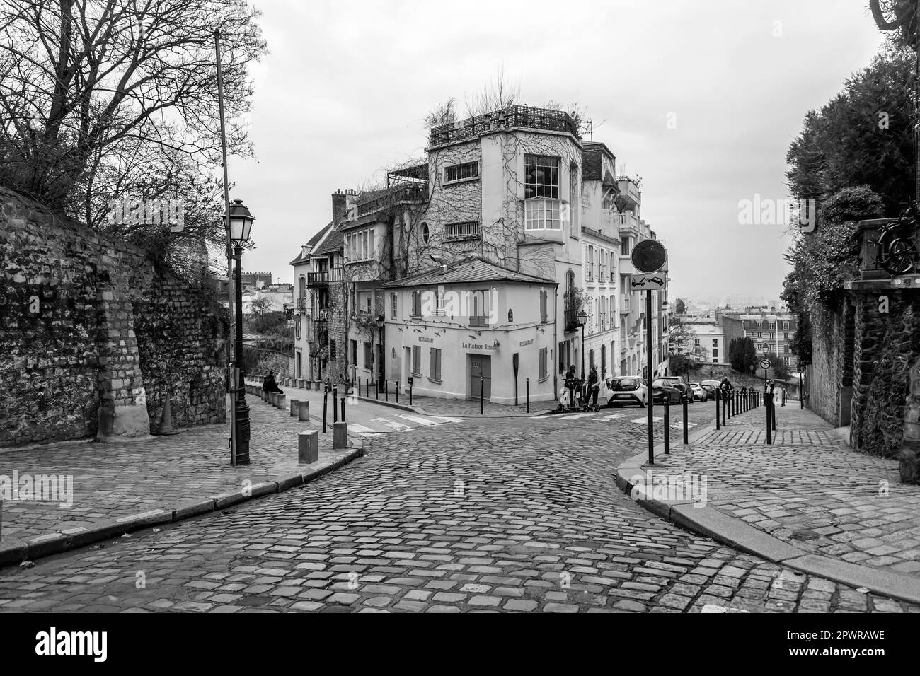 Paris, France - January 19, 2022: Street view from Montmartre, one of the most vibrant and popular districts of Paris, the French capital. Stock Photo