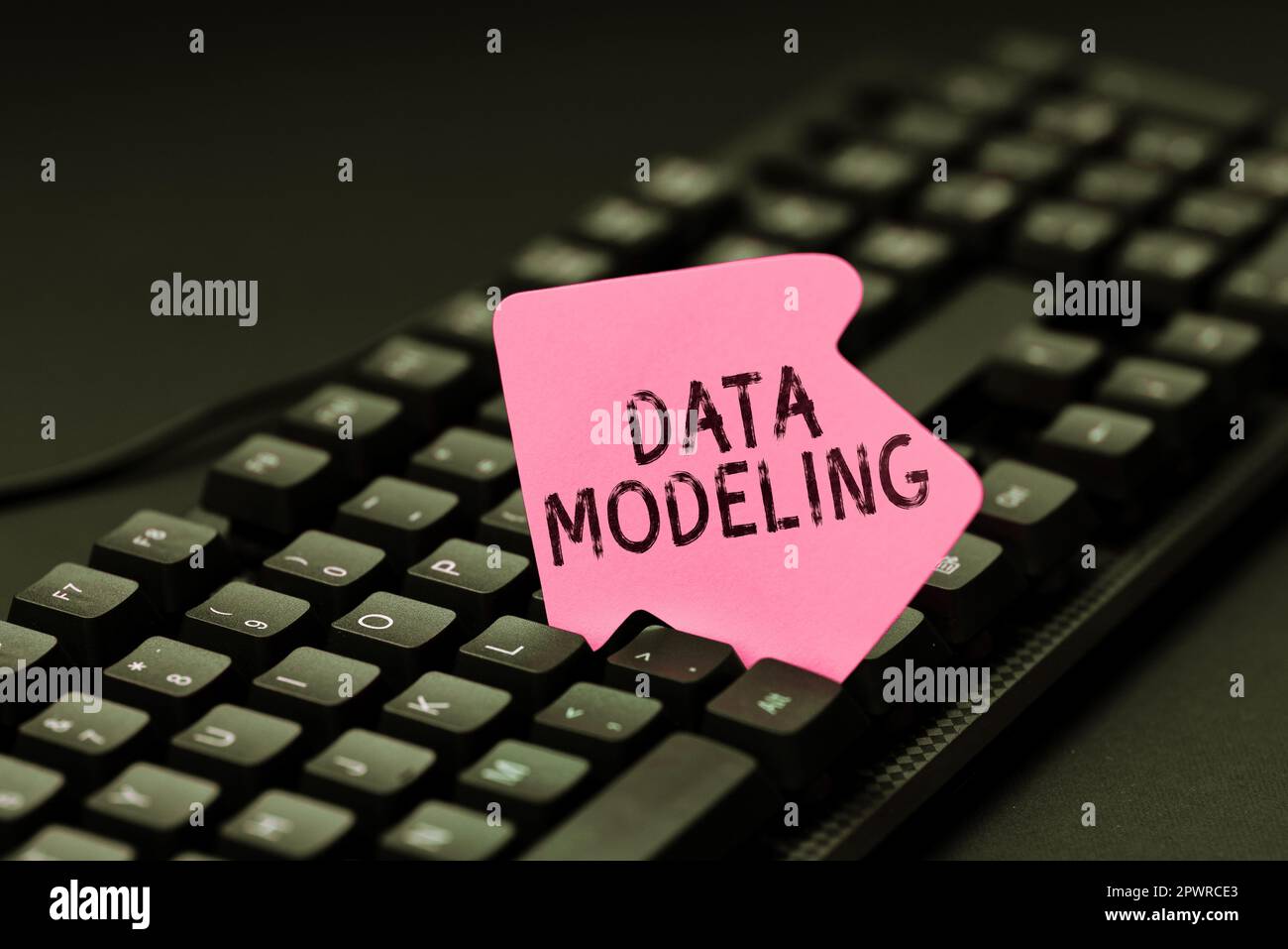 Hand writing sign Data Modeling, Business approach process of transferring data between data storage systems Stock Photo
