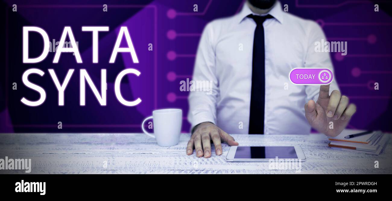 Writing displaying text Data Sync, Conceptual photo data that is continuously generated by different sources Stock Photo