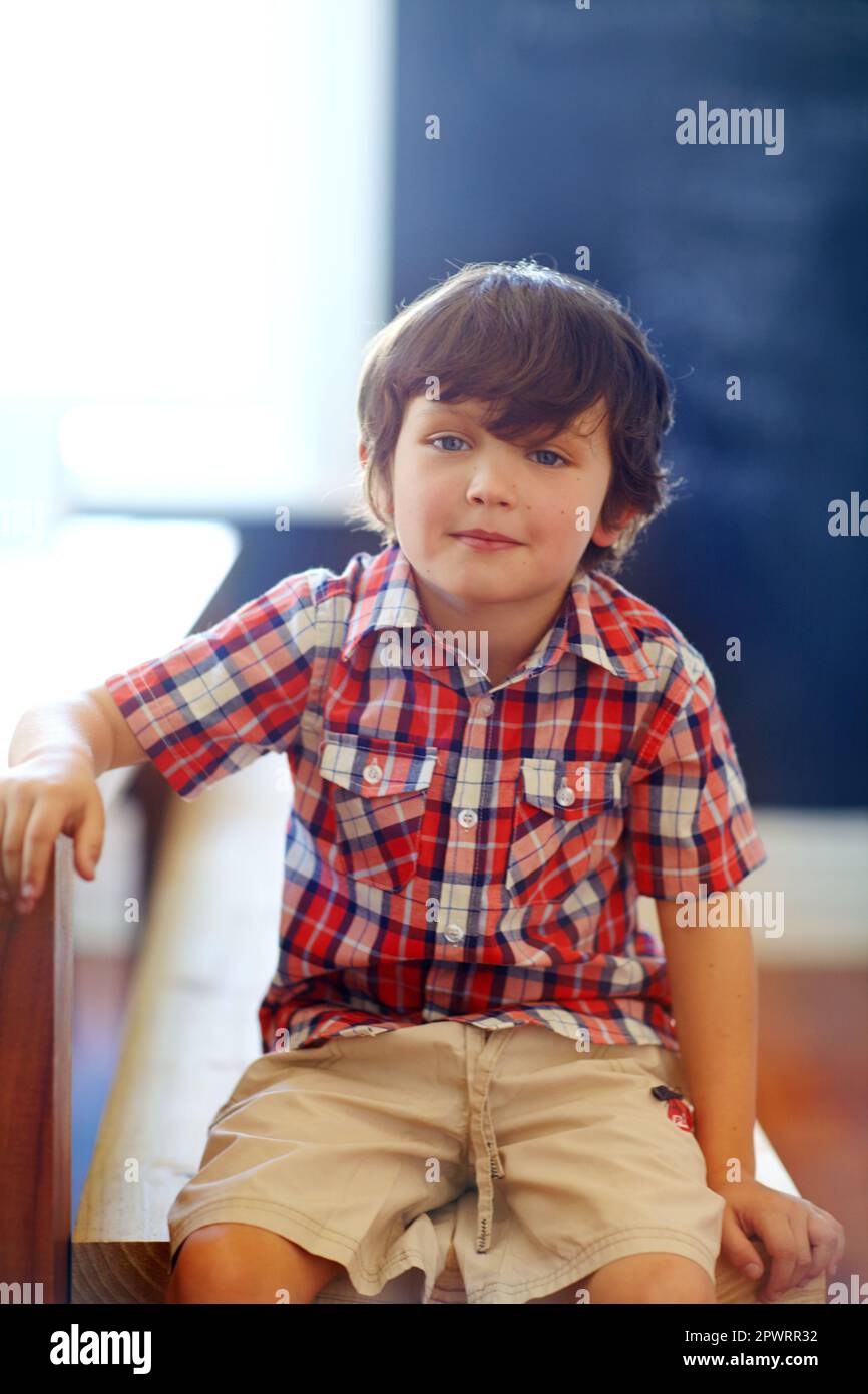 Let them be little. a cute little boy looking at the camera Stock Photo ...