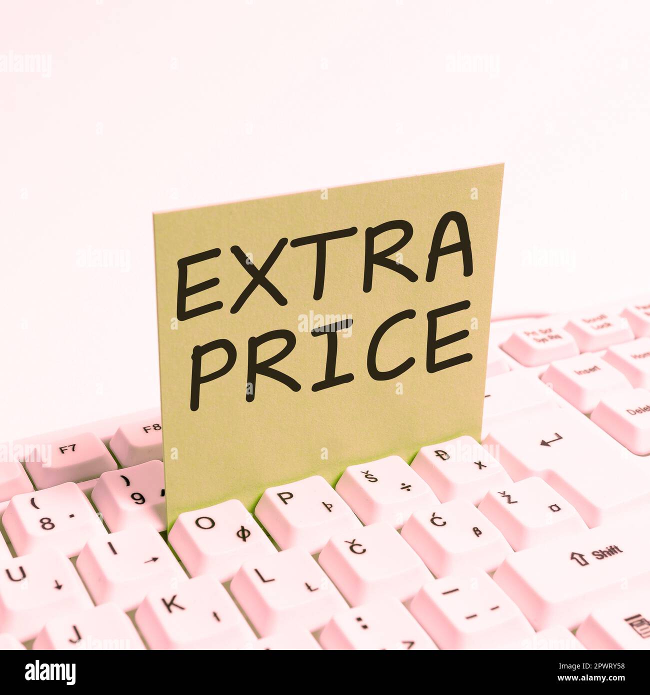 Text sign showing Extra Price, Business showcase extra price definition  beyond the ordinary large degree Stock Photo - Alamy