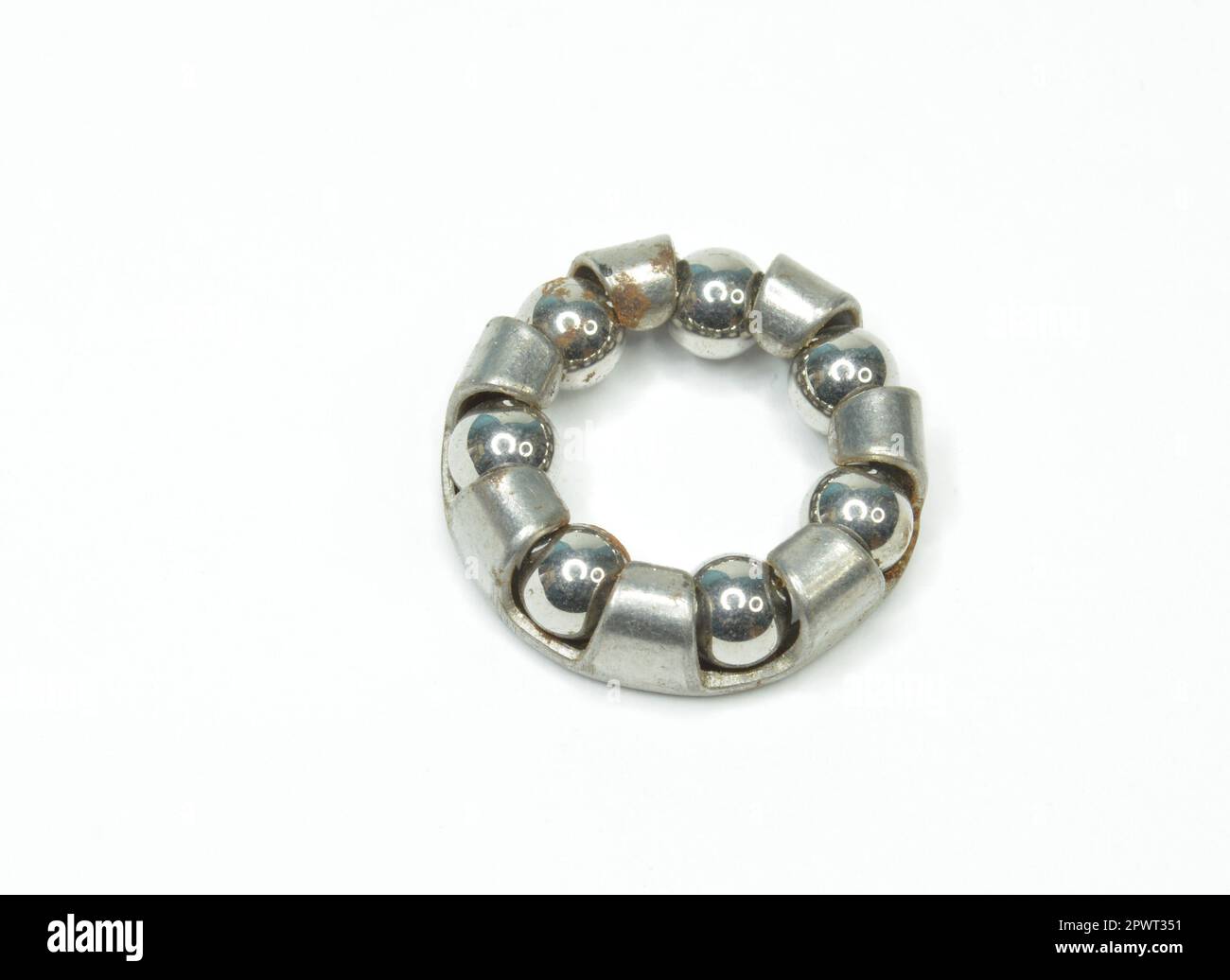 Vintage Stainless steel ball bearings on white background Stock Photo