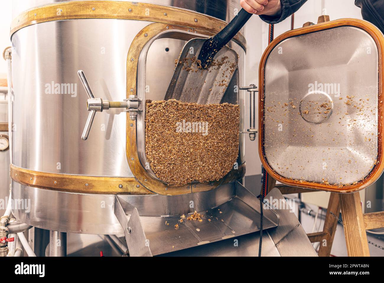 Mashing of milled malt grains for preparing malt. Process of brewing grain of barley Stock Photo