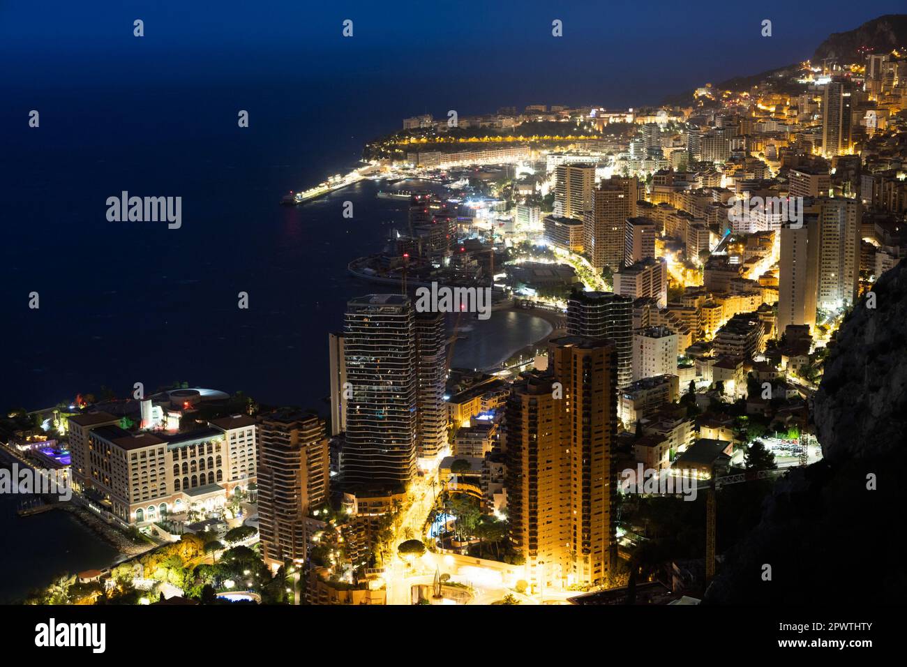 Monte Carlo panorama illuminated by night. Urban landscape with luxury ...