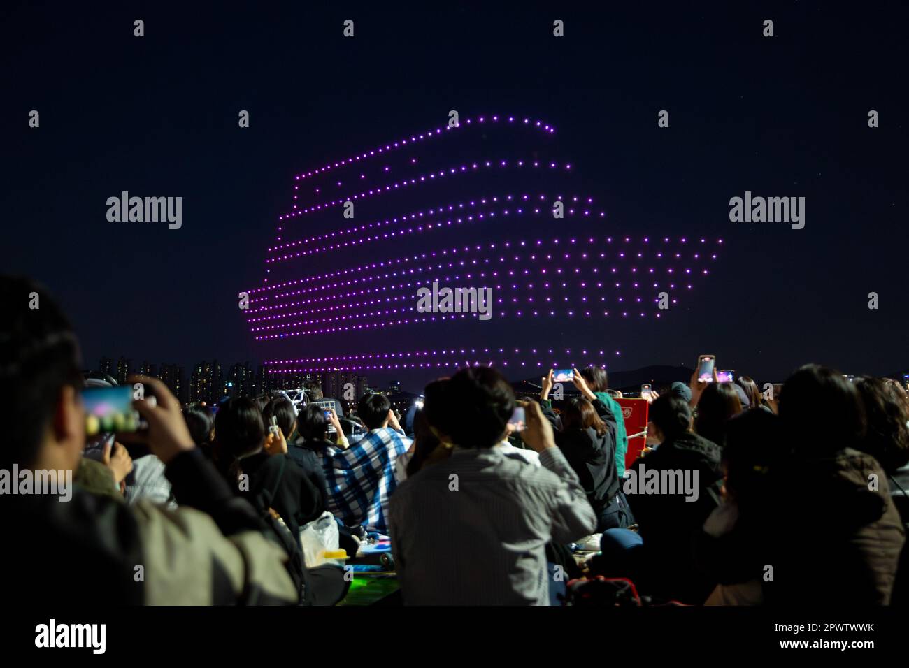 Seoul, South Korea. 1st May, 2023. People watch a drone light show at