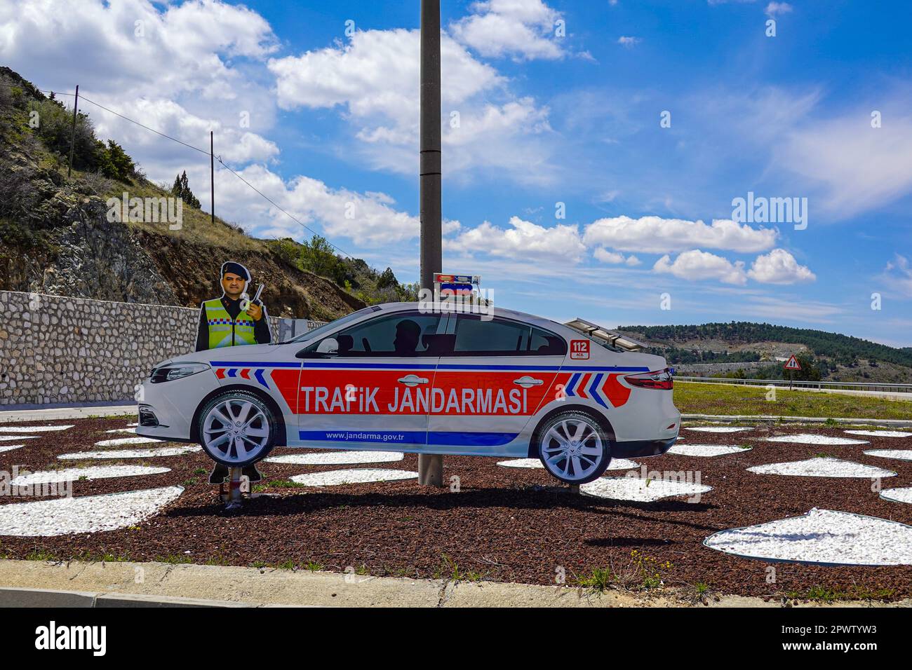 Model Police Car to deter speeding, near Salda Lake, Lake Salda, Salda Golu, Salda, Antalya, Turkey Stock Photo