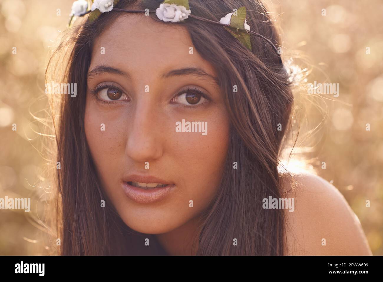 Shes a flower child. Cropped portrait of a hippie sitting