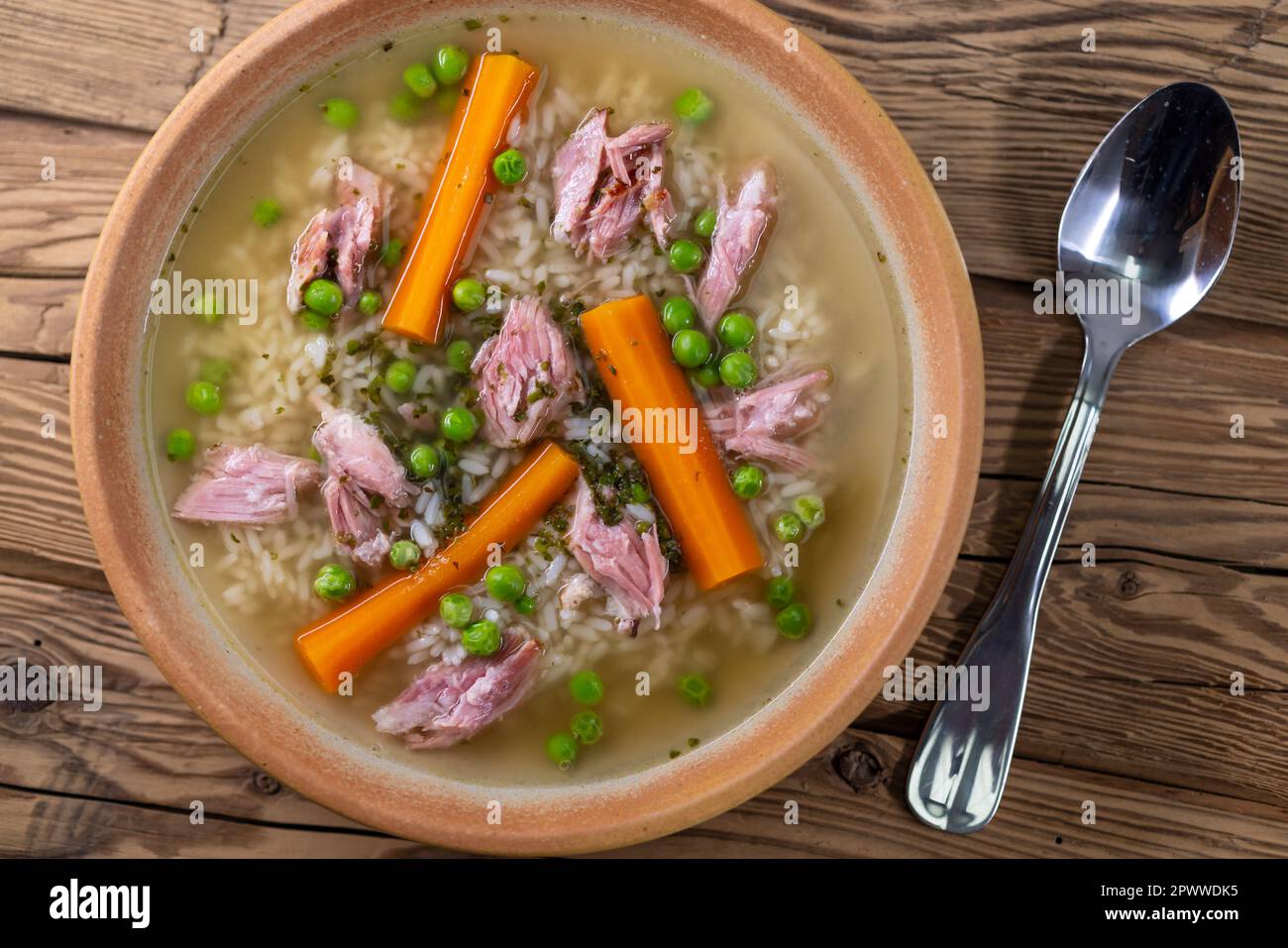 smoked meat soup with vegetables and rice Stock Photo - Alamy