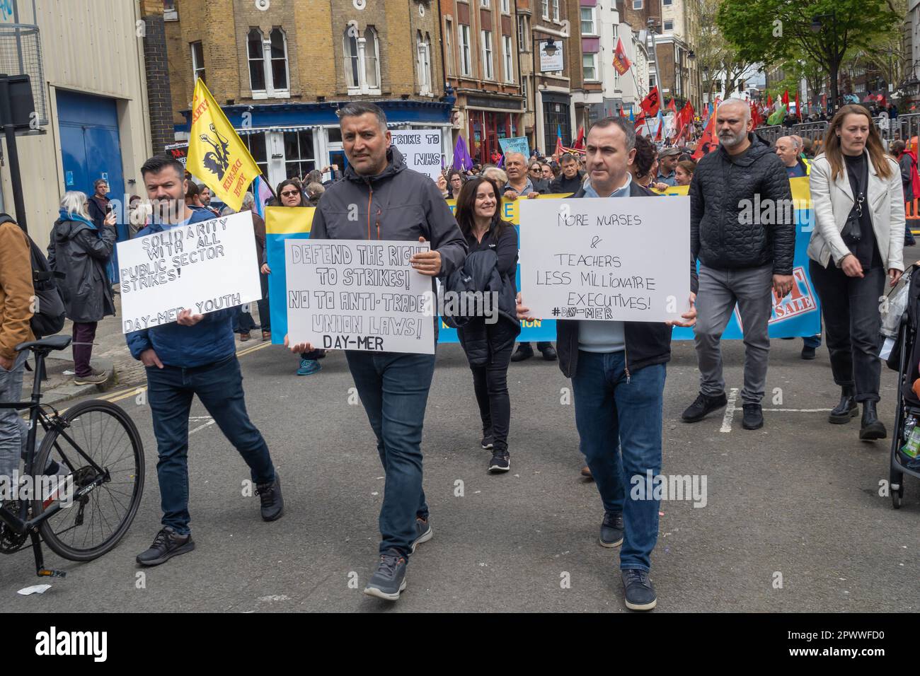 London, UK. 1 May 2023. Day-Mer members march with posters. Several ...