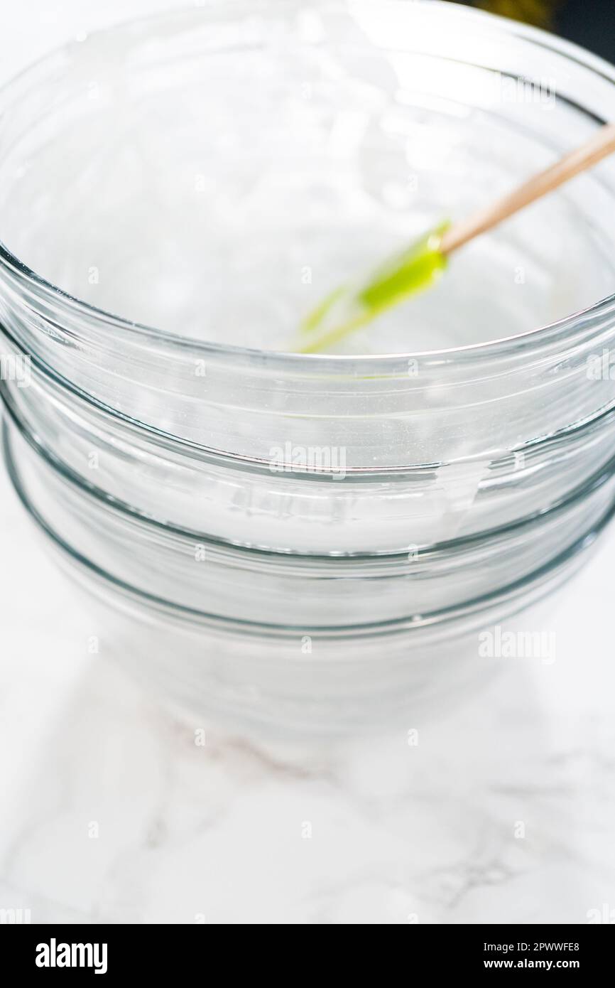 Dirty glass mixing bowls after making royal icing Stock Photo Alamy