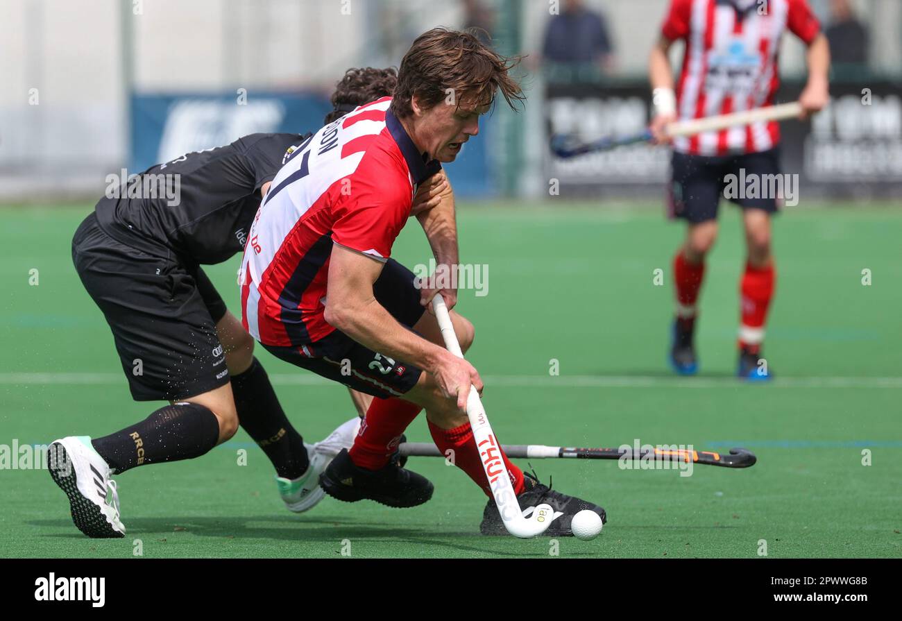 Brussels, Belgium. 01st May, 2023. Leopold's Tom Boon fights for the ball during a hockey game between Royal Racing Club Bruxelles and Royal Leopold Club, Monday 01 May 2023 in Uccle/Ukkel, Brussels, on day 21 of the Belgian Men Hockey League season 2022-2023. BELGA PHOTO VIRGINIE LEFOUR Credit: Belga News Agency/Alamy Live News Stock Photo