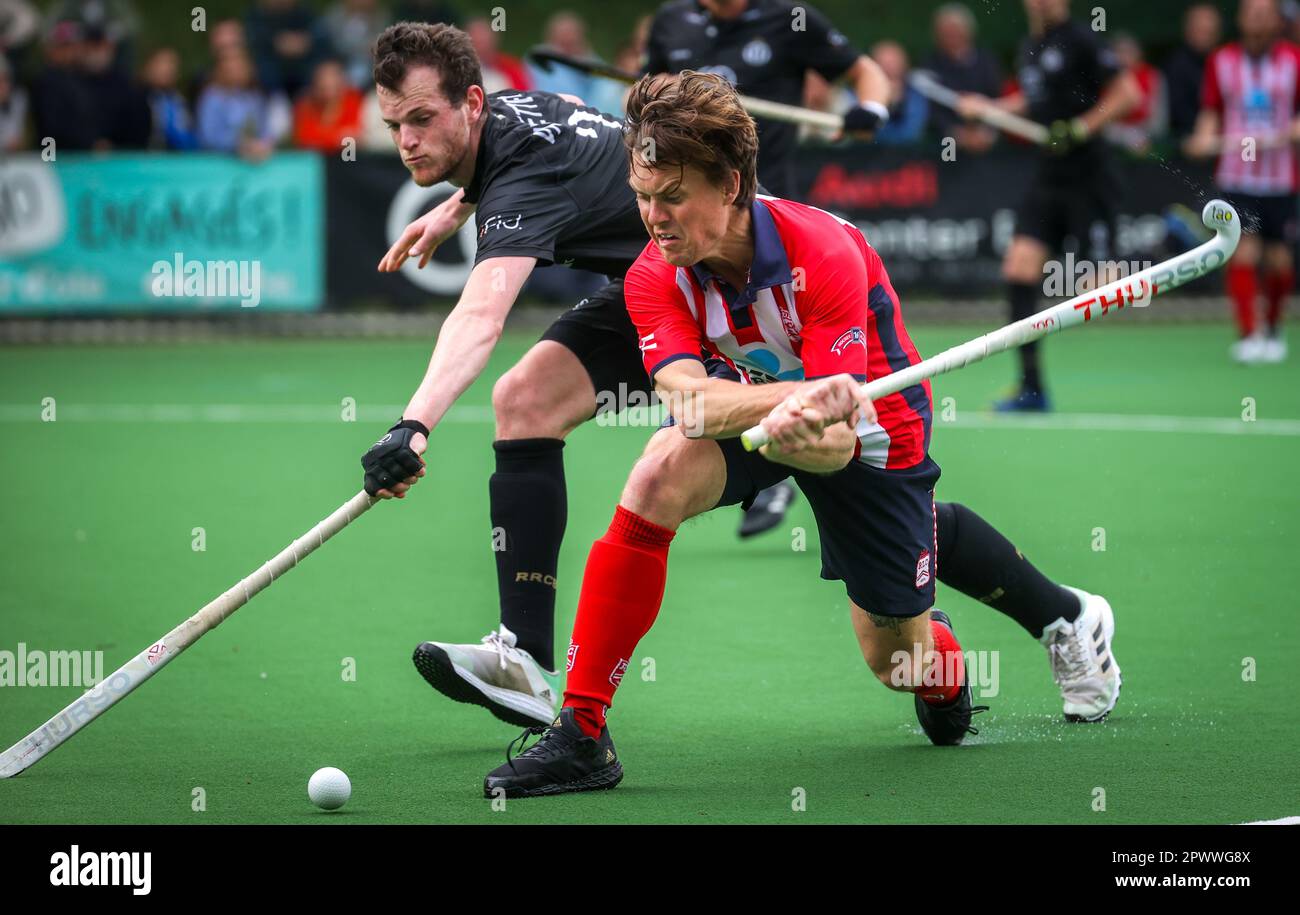 Brussels, Belgium. 01st May, 2023. Leopold's Tom Boon fights for the ball during a hockey game between Royal Racing Club Bruxelles and Royal Leopold Club, Monday 01 May 2023 in Uccle/Ukkel, Brussels, on day 21 of the Belgian Men Hockey League season 2022-2023. BELGA PHOTO VIRGINIE LEFOUR Credit: Belga News Agency/Alamy Live News Stock Photo