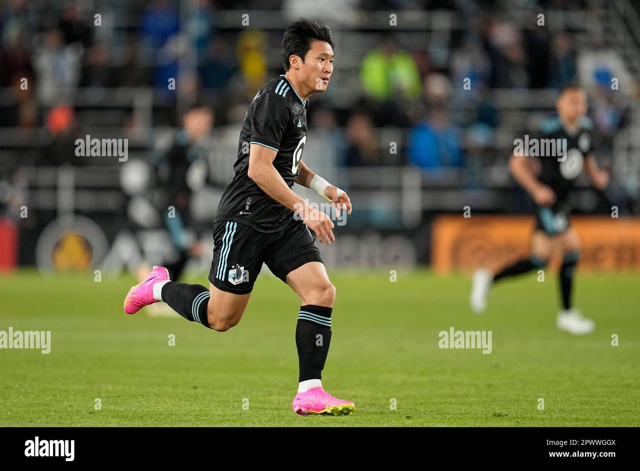 Minnesota United midfielder Sang Bin Jeong runs across the field during the second half of an