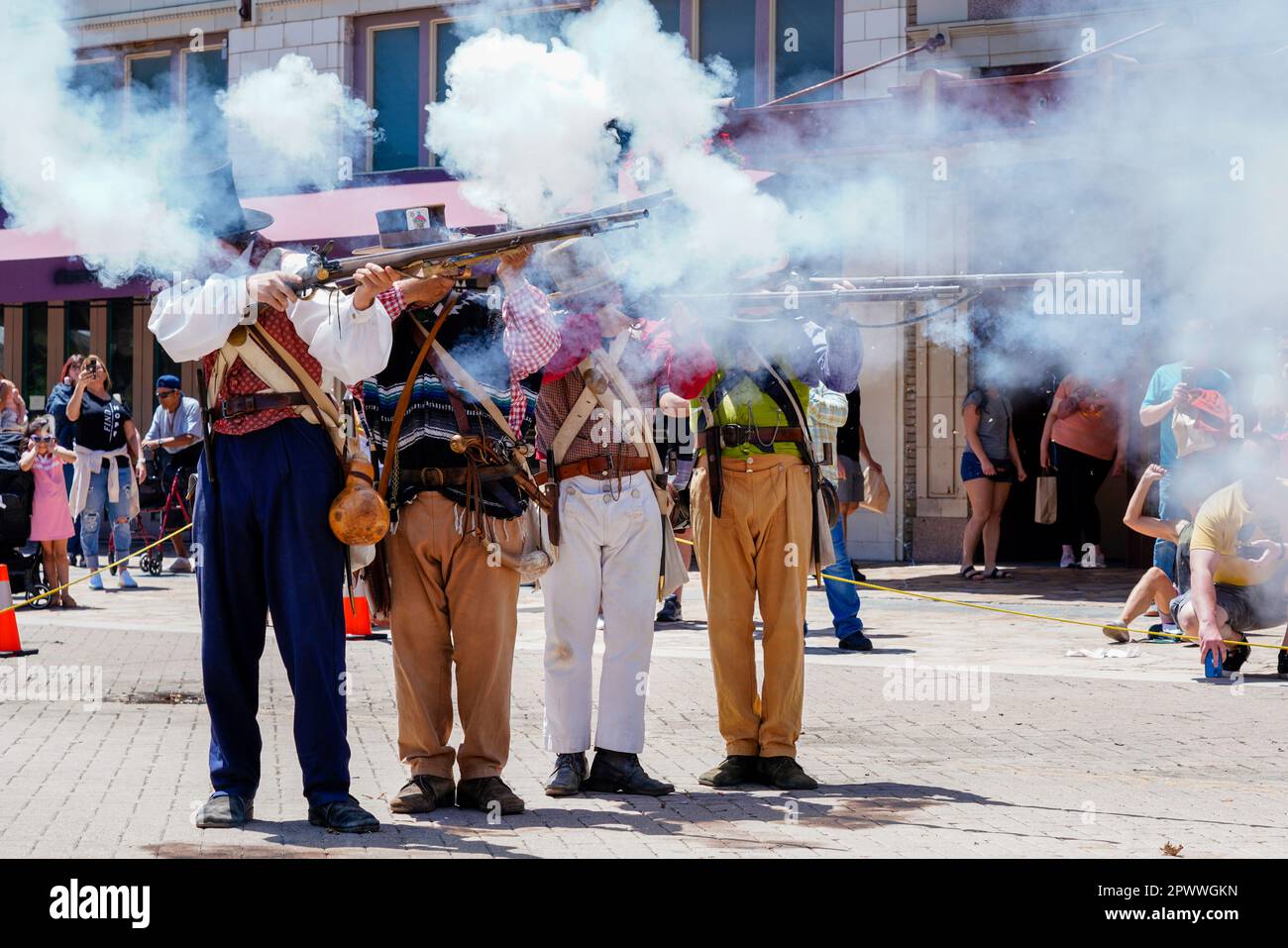 Musket firing re-enactment in front of The Alamo, Austin, Texas. Stock Photo