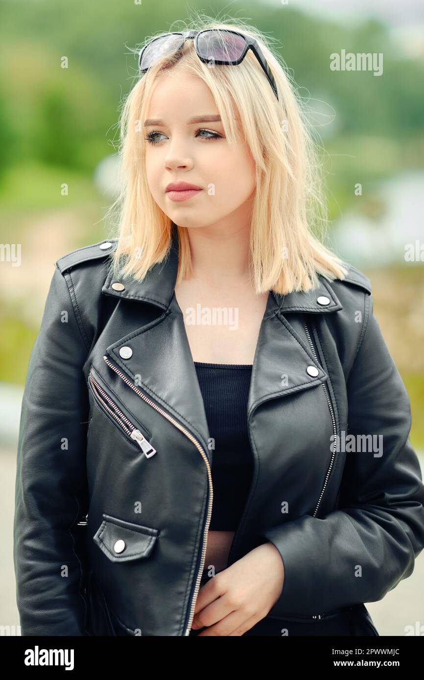Attractive black girl in leather hi-res stock photography and images
