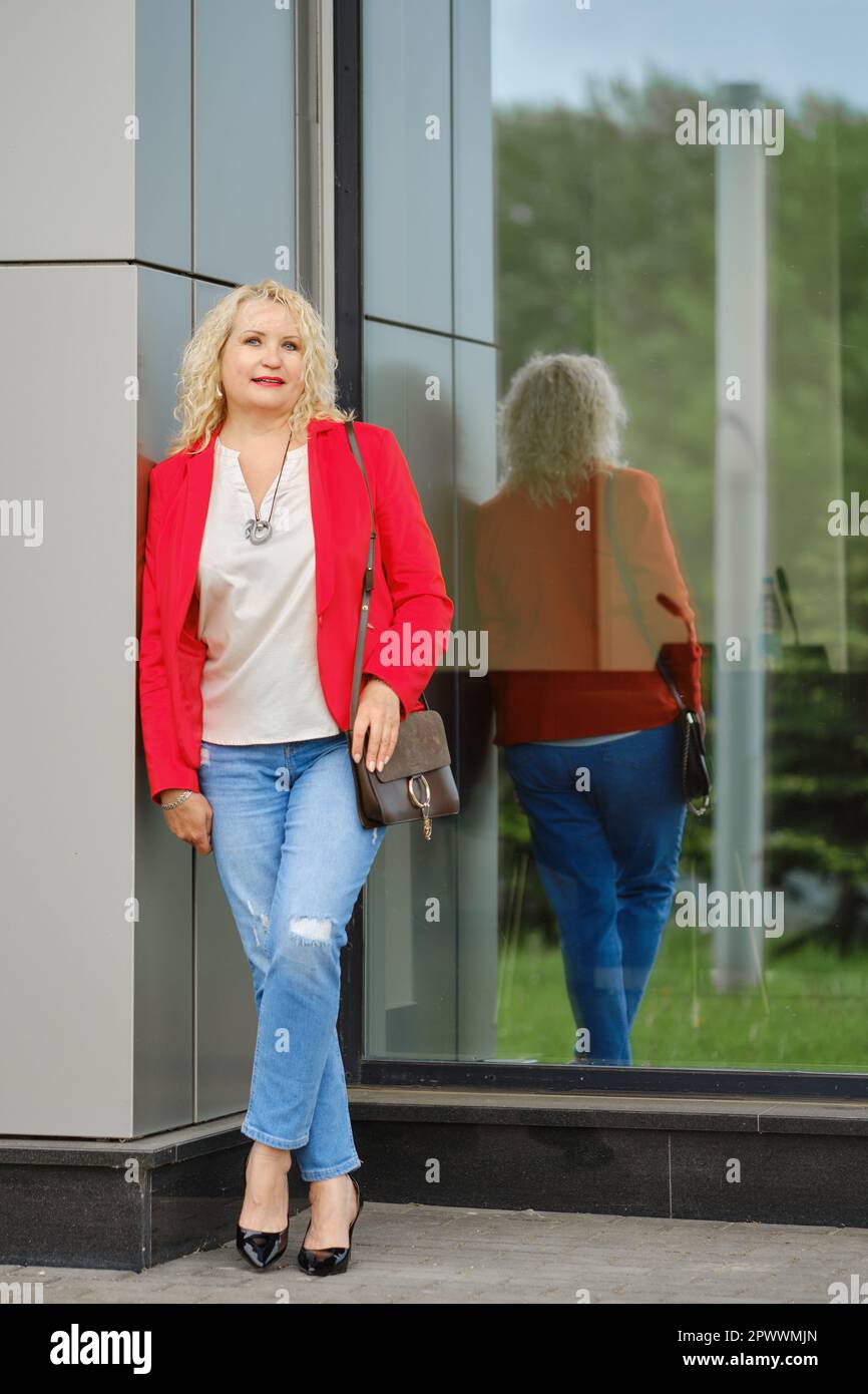 Woman denim jeans full length mature hi-res stock photography and ...