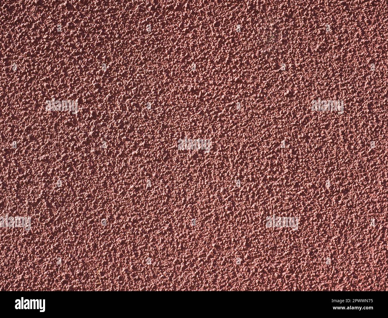 red plaster wall useful as a background Stock Photo - Alamy