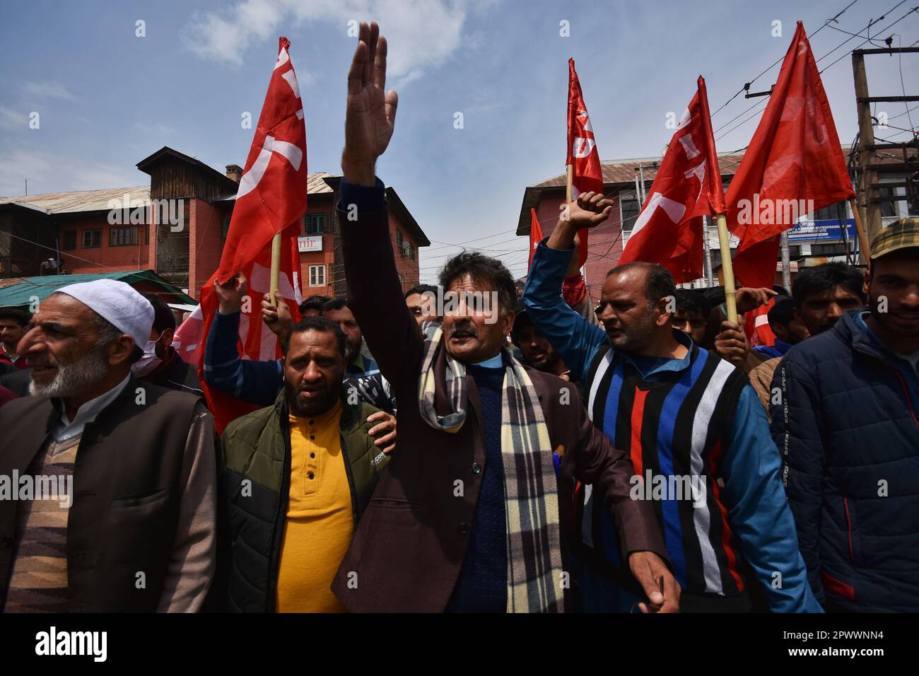 May 1, 2023, Srinagar, Jammu and Kashmir, India: Kashmiri government contractual workers and daily wagers from various labour groups shout slogans as they stage a protest marking the International Labor Day on May 01, 2023 in Srinagar, Indian administered Kashmir, India. Hundreds of Kashmiri government contractual workers and daily wagers from various labour groups took part in a rally on International Labor Day and staged a demonstration to draw attention to their hardships caused by the delay in fulfilling their demands. The demonstrators demanded an increase in their salary. The protest mar Stock Photo