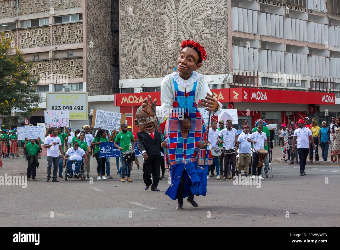 Protesters March with Drums and Giant Puppets in Africa Demanding Equal Rights for People with Disabilities Stock Photo