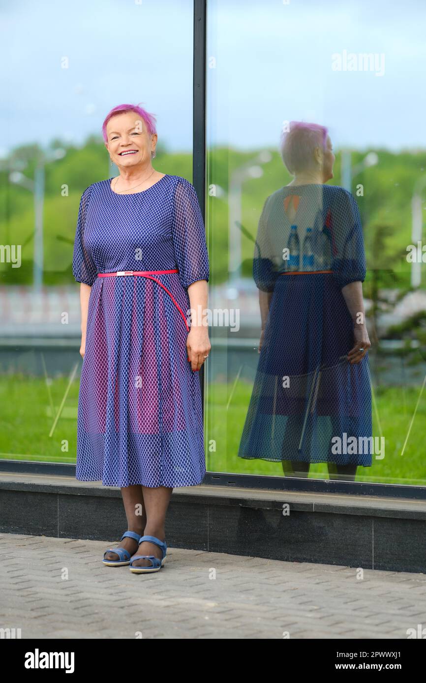 Mature woman and old blue dress hi-res stock photography and images - Alamy Mature woman and old blue dress hi-res stock photography and images - Alamy