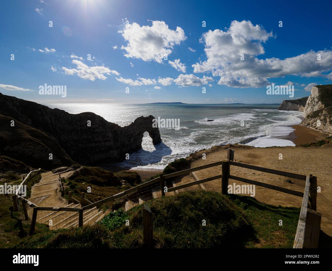 Steps down to the beach at Durdle door on a sunny day in March, Dorset, UK Stock Photo