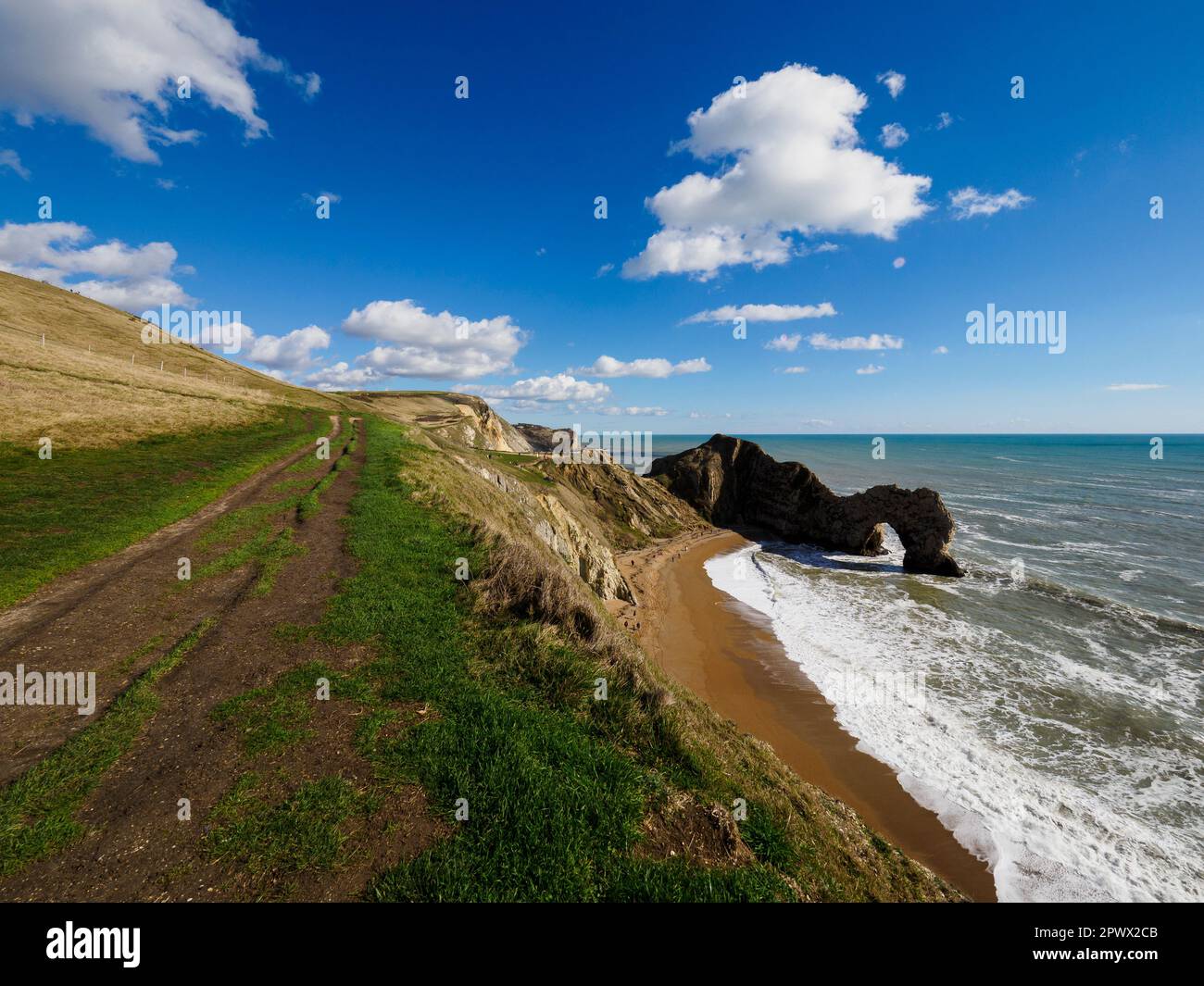 Coast path above Durdle door and beach on a sunny day in March, Dorset, UK Stock Photo