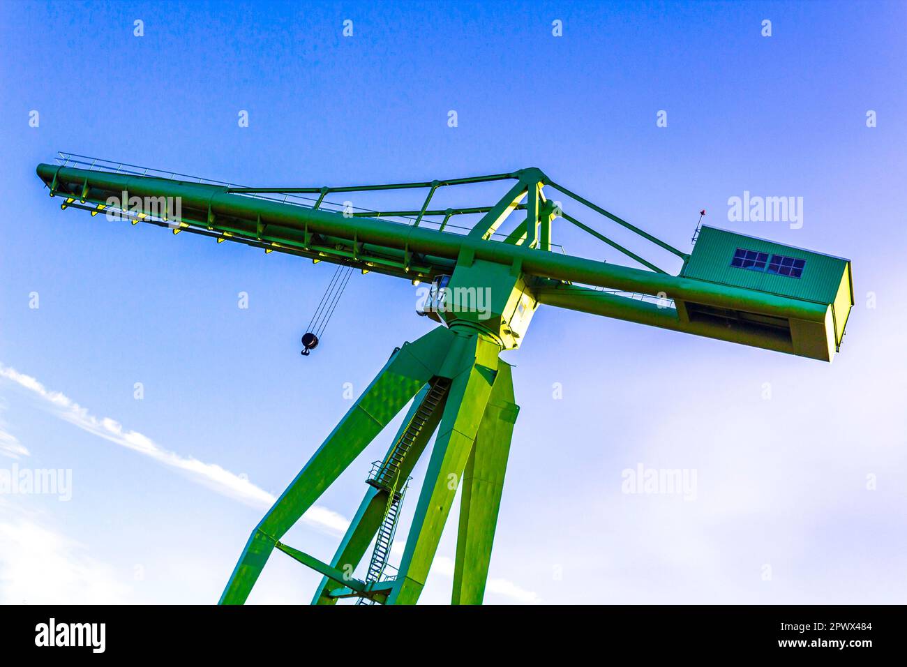 Green large ship crane container crane Rickmerswerft tower crane in Center Central South Bremerhaven Bremen Germany. Stock Photo