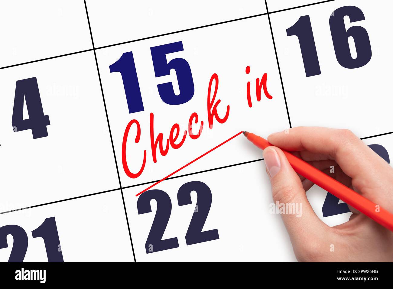 15th day of the month. Hand writing CHECK IN and drawing a line on ...