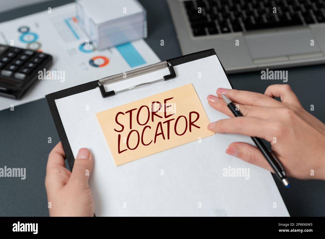Text sign showing Store Locator, Concept meaning to know the address contact number and operating hours Stock Photo