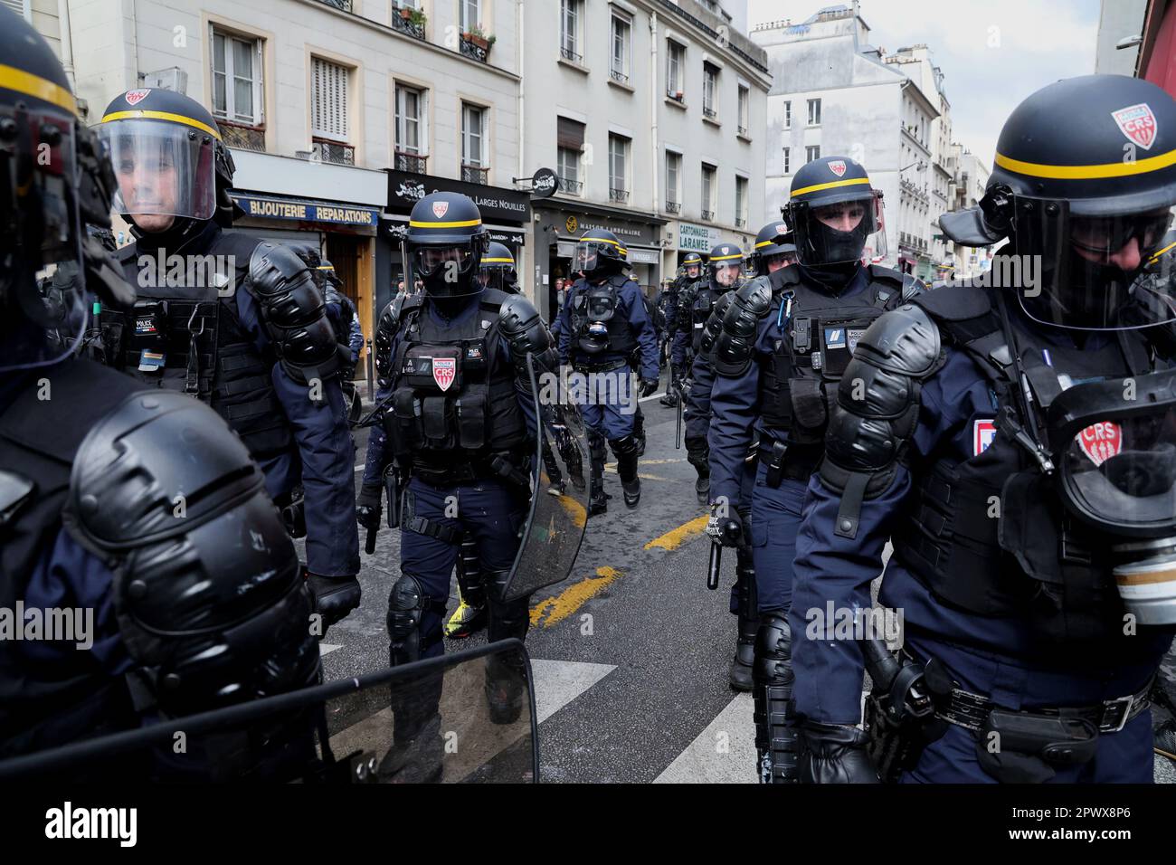 Paris, France. 01st May, 2023. Police take position during a Labor Day mass protest in the streets of Paris, on Monday, May 1, 2023. Clashes erupted between security forces and radical protesters smashing bank windows as unions pushed the president to scrap a higher retirement age. Photo by Maya Vidon-White/UPI Credit: UPI/Alamy Live News Stock Photo
