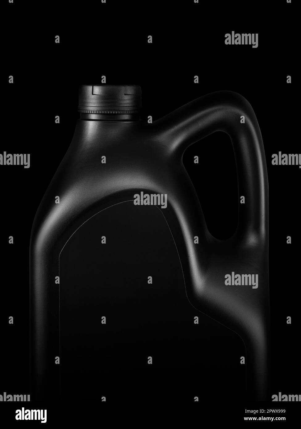Plastic black canister for machine oil isolated on black background