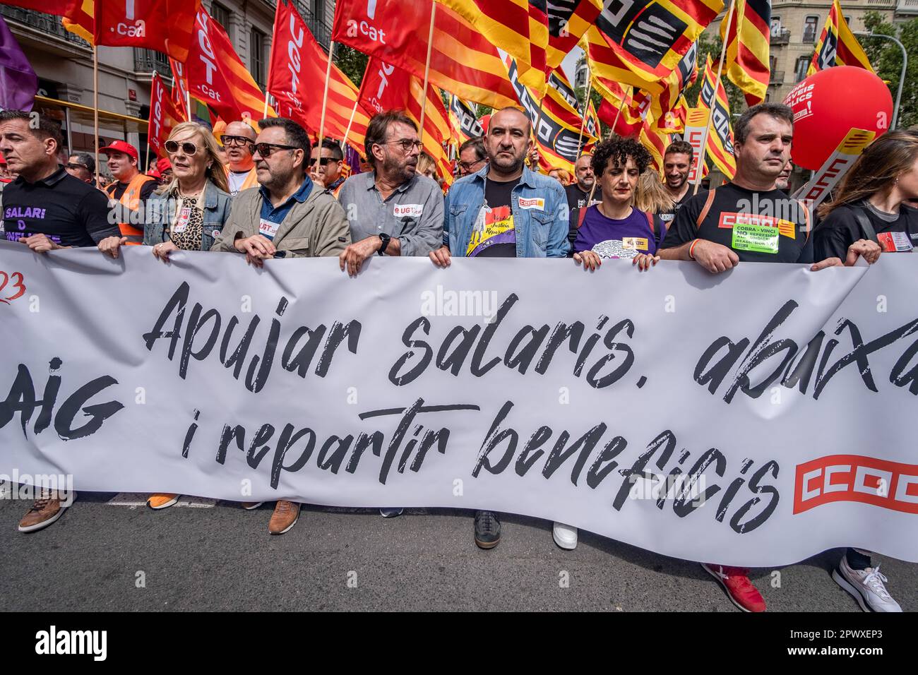 Barcelona, Spain. 01st May, 2023. Protesters hold flags and the unitary banner of the International Worker's Day during the demonstration. Thousands of people have demonstrated in the center of Barcelona called by the majority unions UGT and CCOO to celebrate International Workers' Day. (Photo by Paco Freire/SOPA Images/Sipa USA) Credit: Sipa USA/Alamy Live News Stock Photo