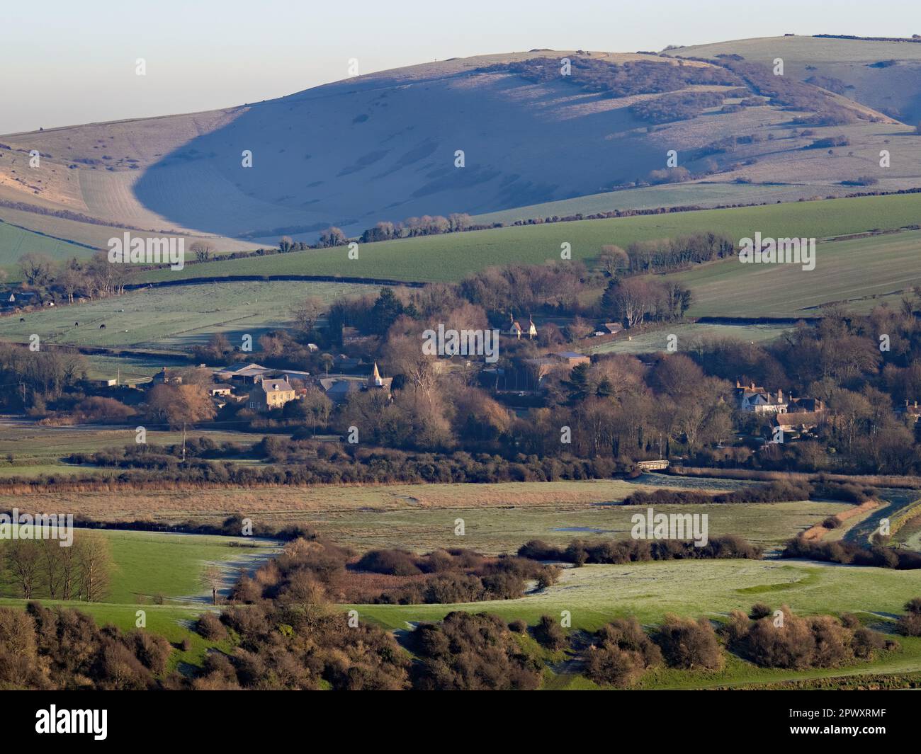 Village of Litlington in East Sussex, from High and Over across to Windover Hill. Stock Photo