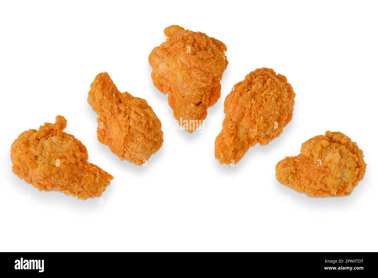 Top view of semifinished frozen chicken drumsticks ready for deep