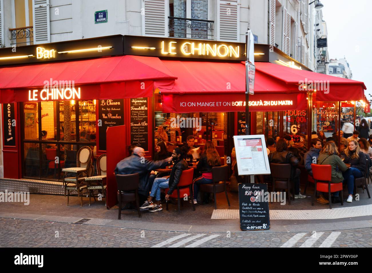 Cafe Chinon is a traditional French cafe in the middle of Montmartre district, Paris, France. Stock Photo