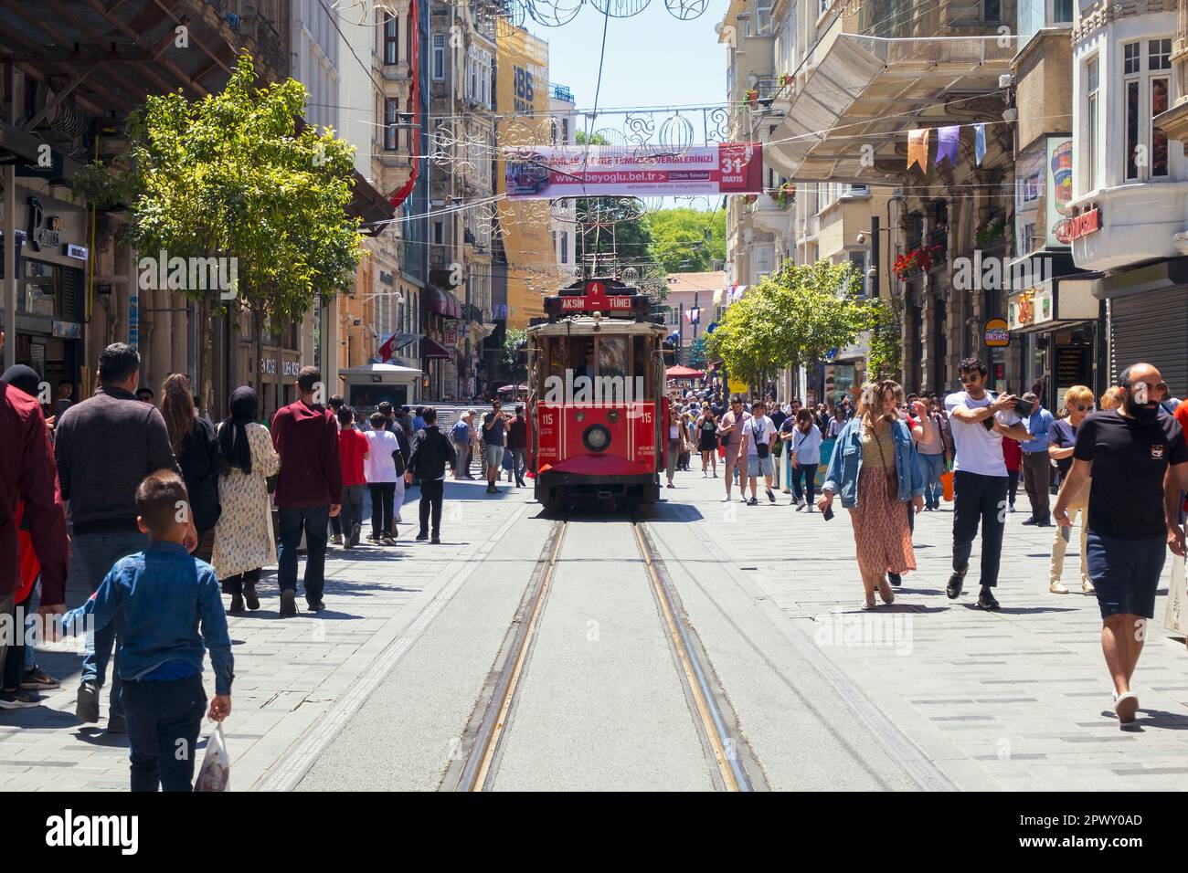Istanbul, Turkey - May, 2022. Istiklal Street and red tram, the most famous street and entertainment area in the center of Istanbul, Turkey. Stock Photo