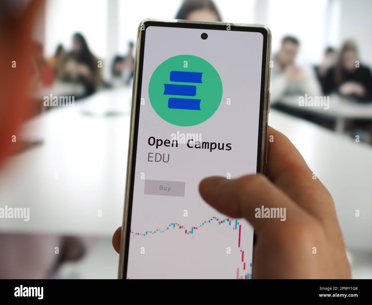 May 1st 2023. An investor analyzing the SUI token price on a phone screen,  looking the launchpad of $SUI on an exchange Stock Photo - Alamy