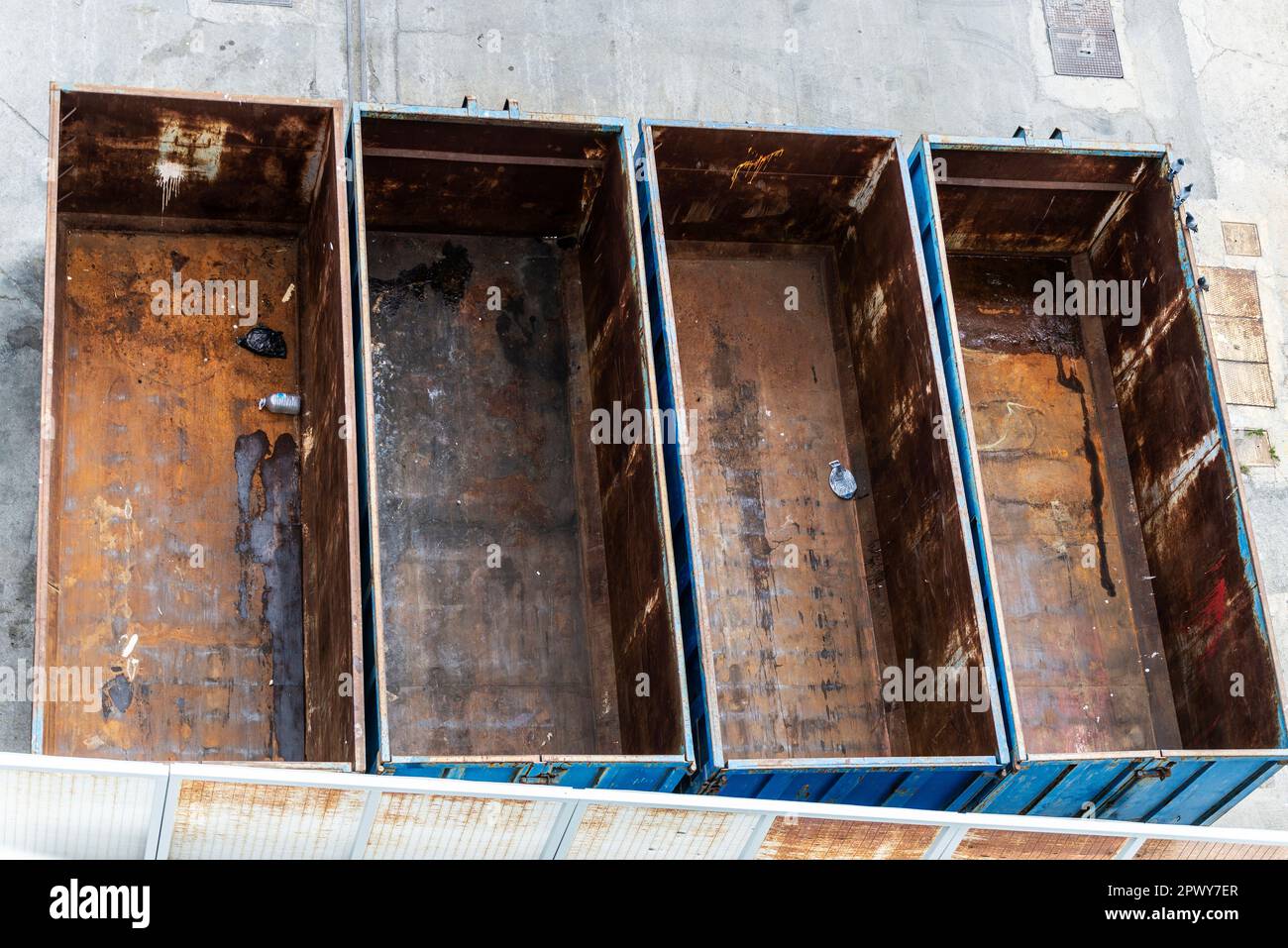 Overview of four old rusty containers as abstract background Stock Photo