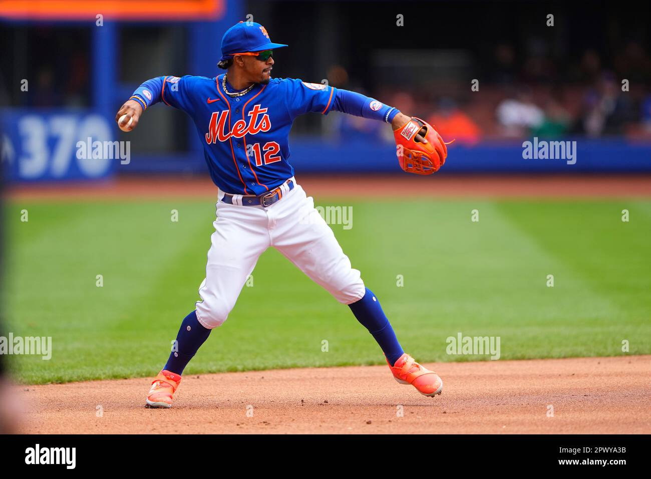 FLUSHING, NY - MAY 01: New York Mets Shortstop Francisco Lindor (12) throws  out Atlanta Braves Shortstop Vaughn Grissom (18) (not pictured) after  fielding a ground ball during the first inning of