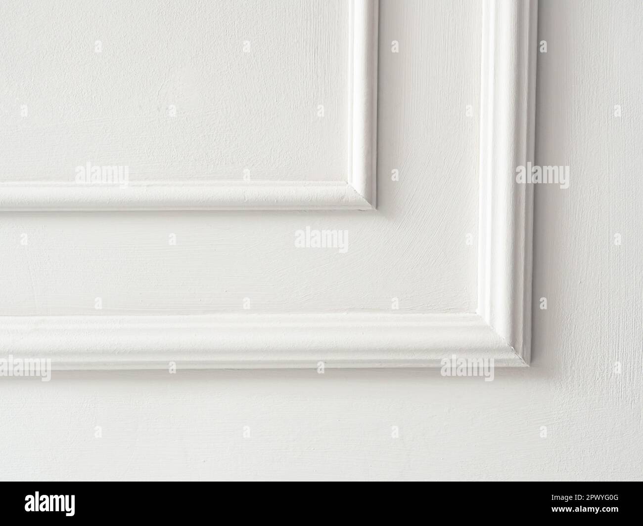 Beautiful ornate white decorative mouldings in studio. Decorative