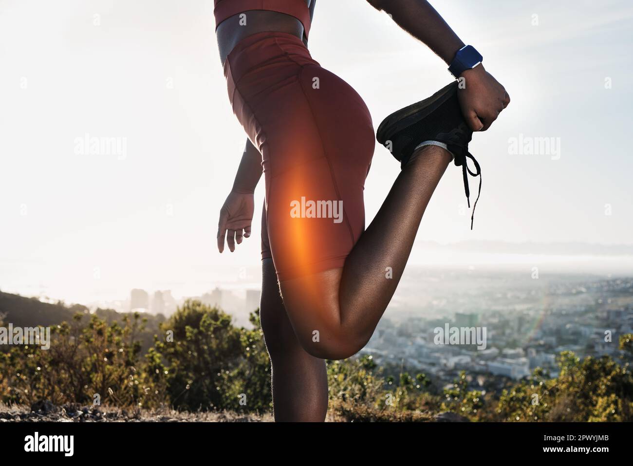 Exercise, fitness and black woman stretching leg outdoors for health or
