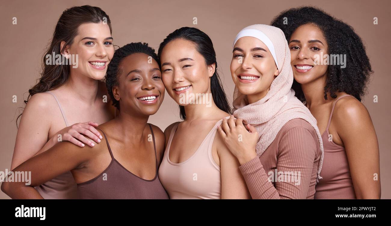 Diversity, happy and women with natural beauty, skincare and cosmetics  together on studio background. Portrait group of female models in underwear  for wellness, real body positivity and self love Stock Photo