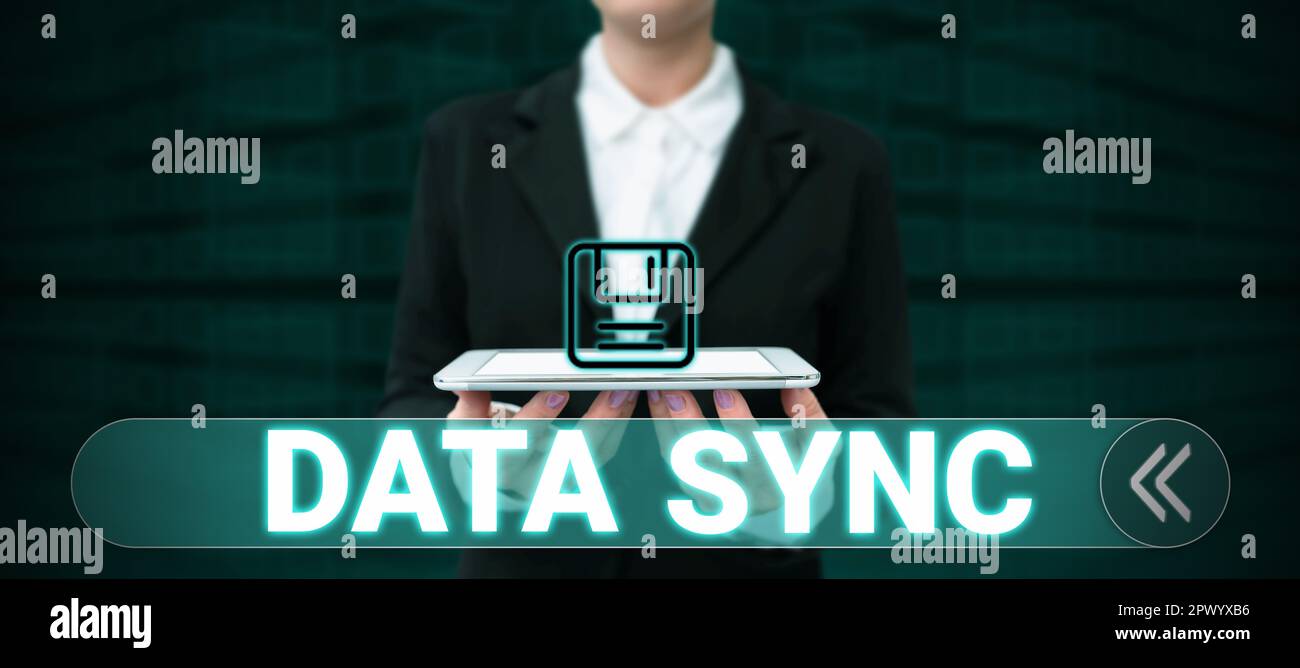 Writing displaying text Data Sync, Business overview data that is continuously generated by different sources Stock Photo