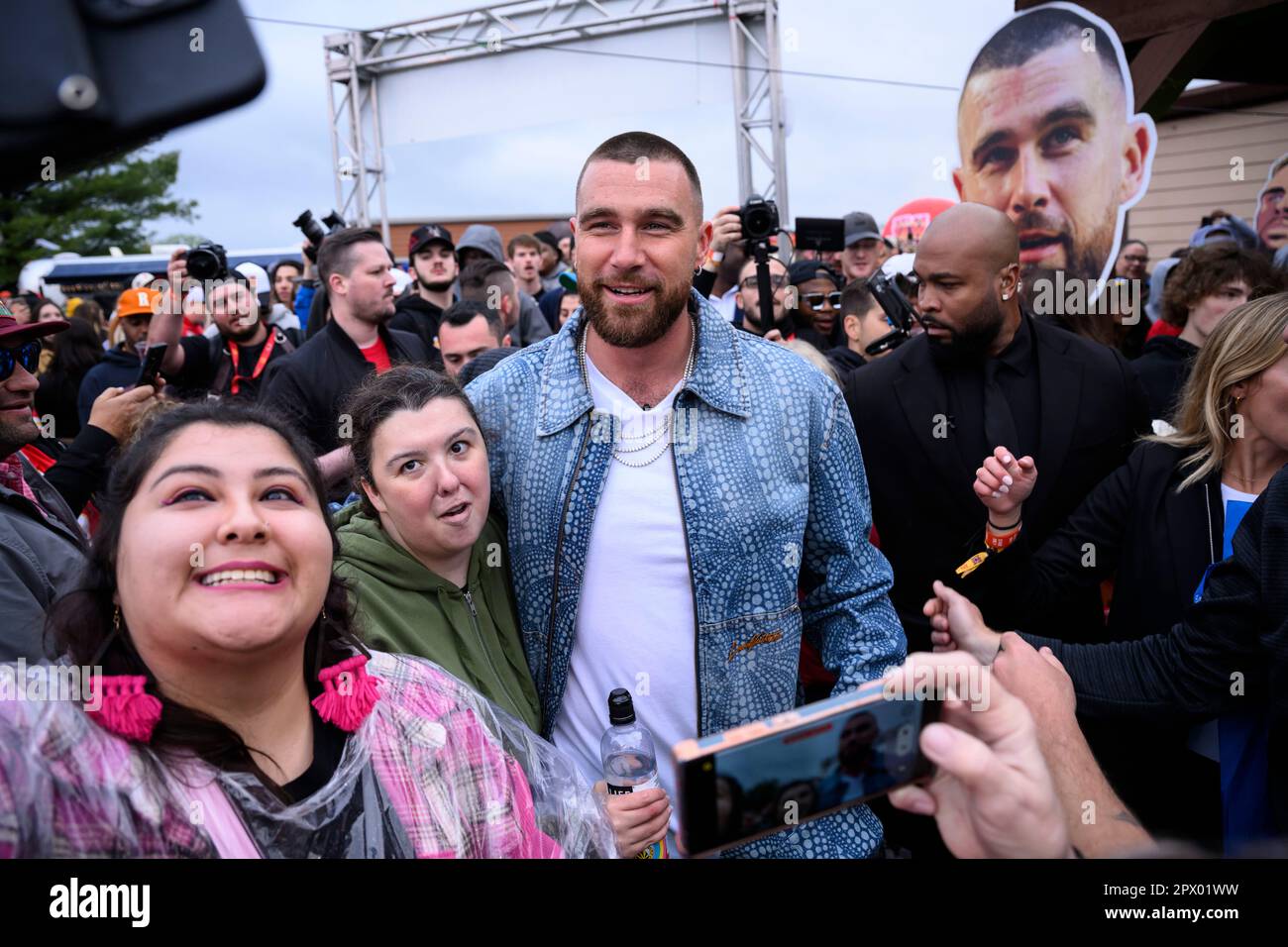 Travis Kelce, Kansas City Chiefs tight end and host of Kelce Jam poses for selfies with fans at