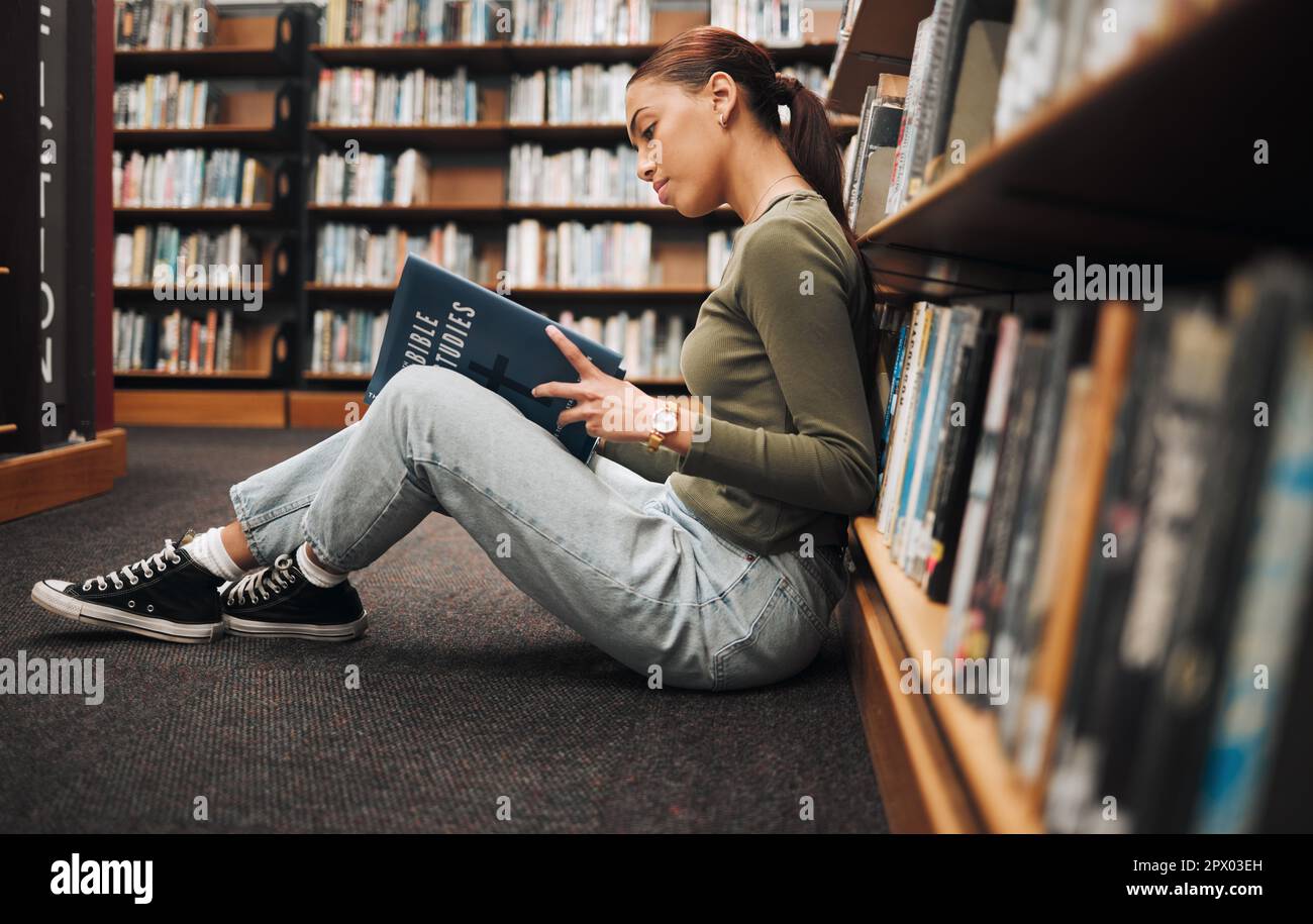 Book, reading and library student on floor with learning, education and