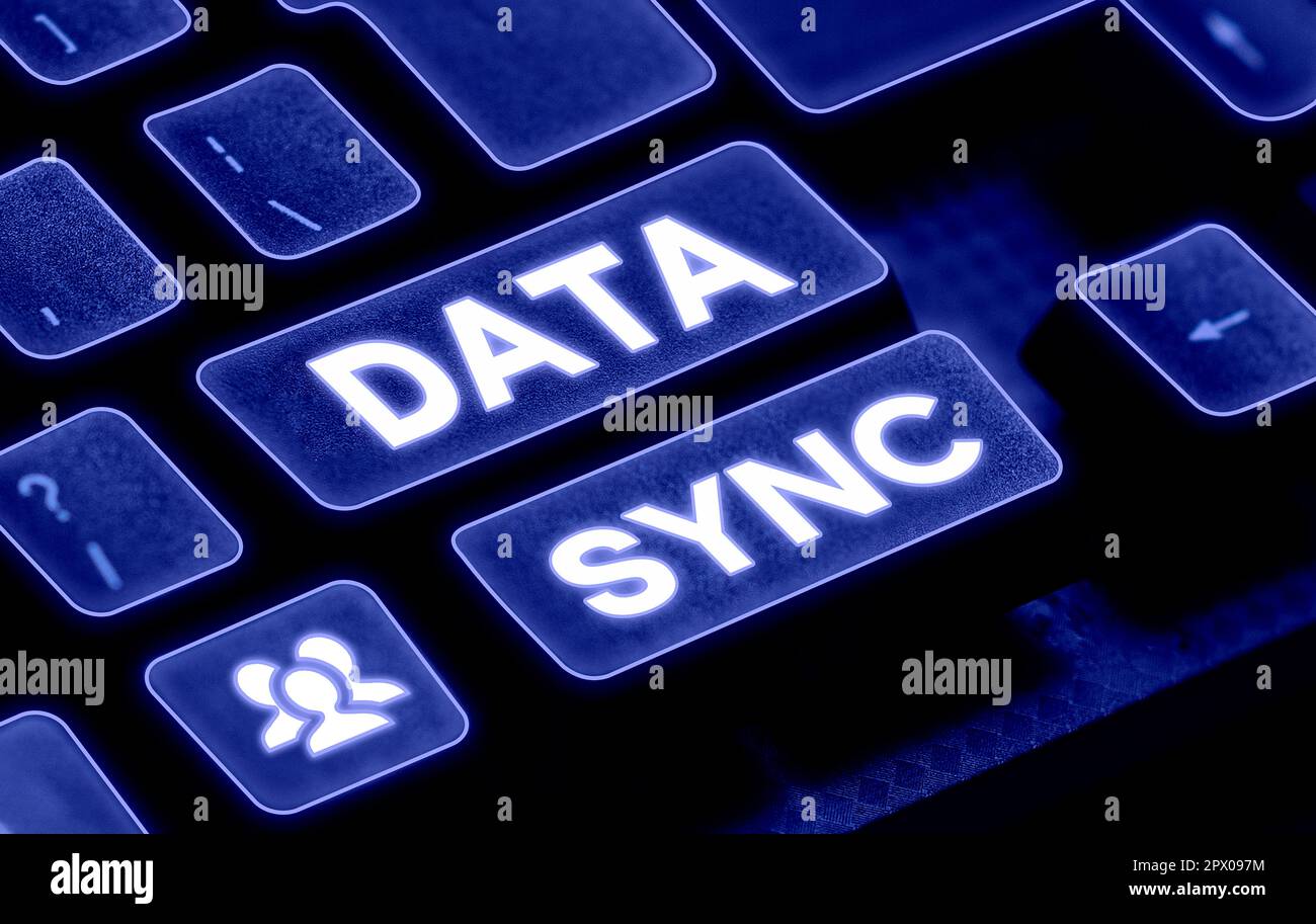 Conceptual caption Data Sync, Word for data that is continuously generated by different sources Stock Photo