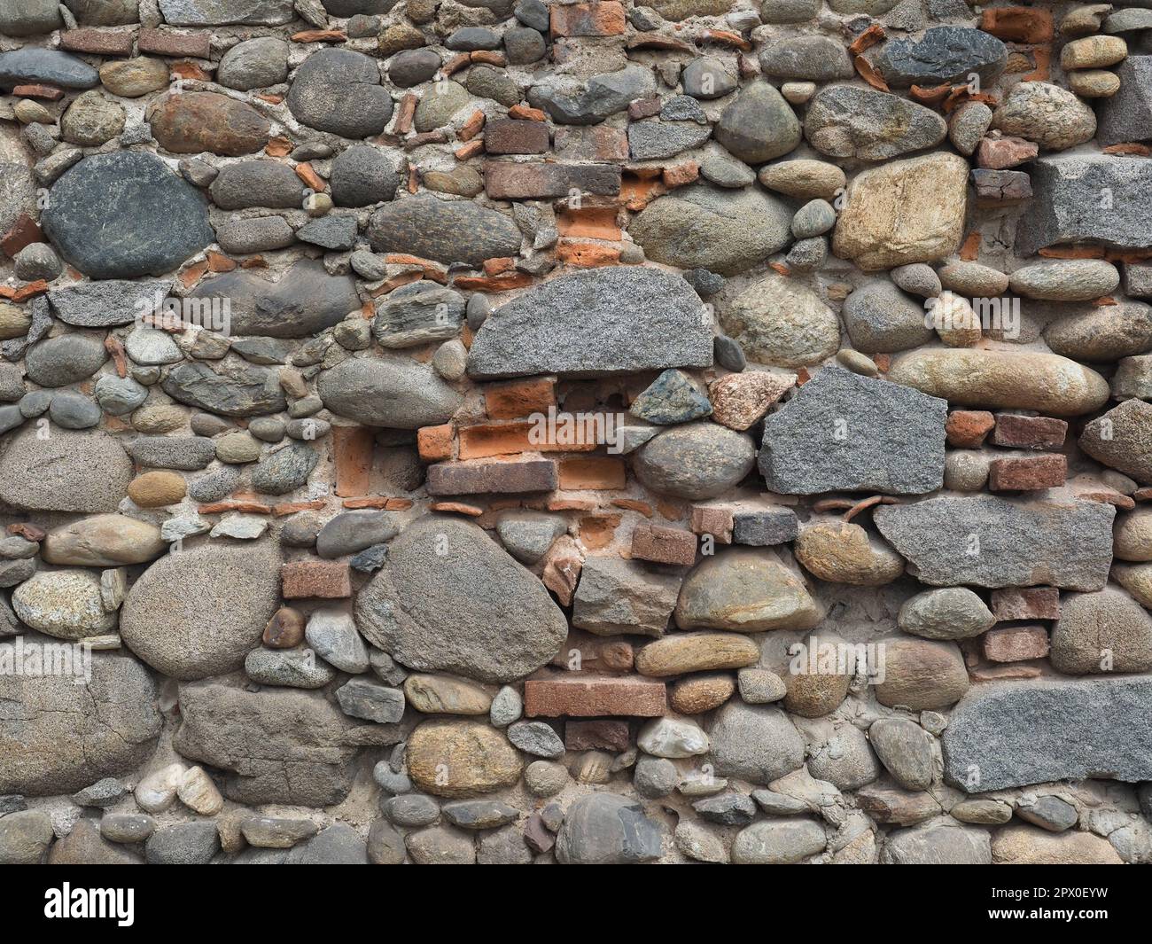 grey stone wall useful as a background Stock Photo - Alamy