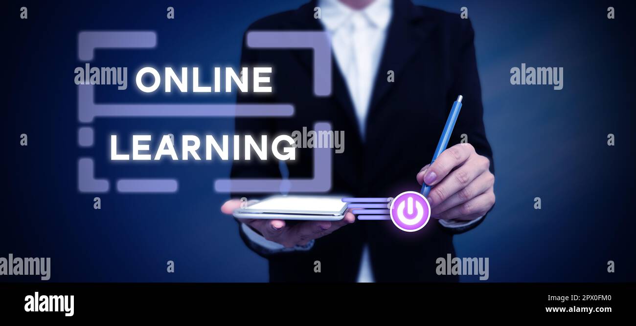 Handwriting text Online Learning, Business showcase Larning with the assistance of the Internet and a computer Stock Photo