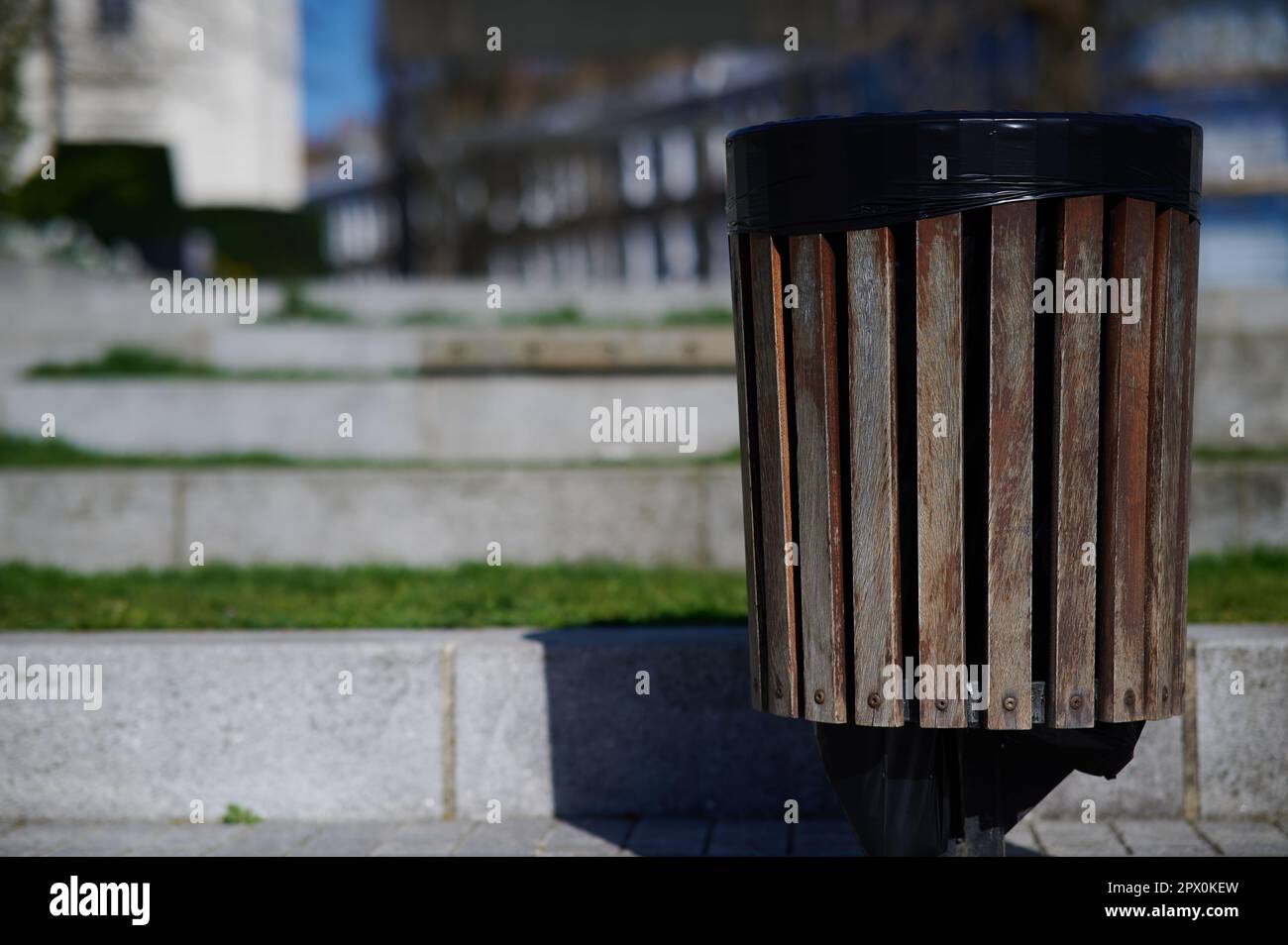 An empty waste litter bin in urban area Stock Photo Alamy